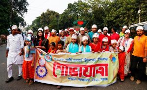 a group of people holding a banner